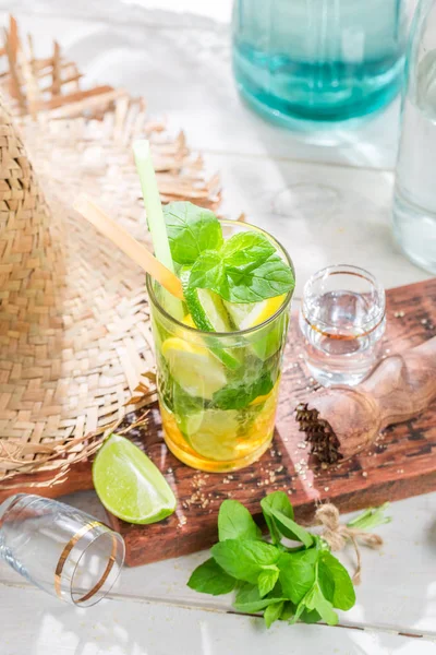 Sweet and fresh mohito with fruits and mint — Stock Photo, Image