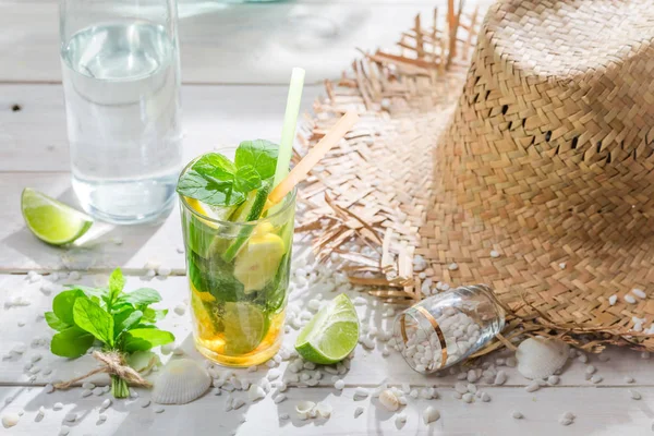 Drink with lime, lemon and sugar in summer — Stock Photo, Image