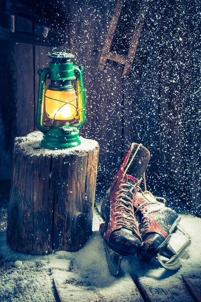Cozy winter hut with skates and wax — Stock Photo, Image