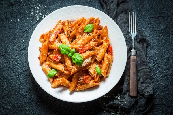 Delicious pasta bolognese with parmesan and basil — Stock Photo, Image