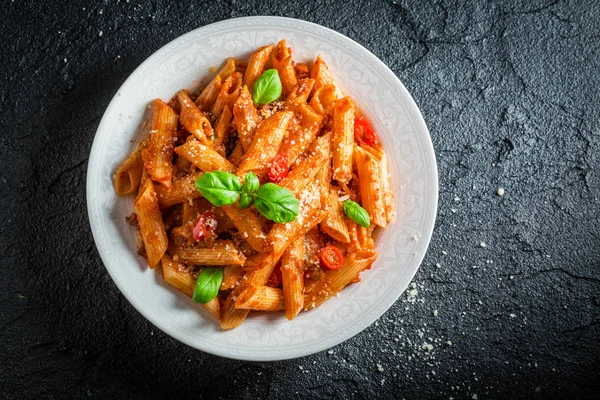 Hot pasta bolognese with parmesan and basil — Stock Photo, Image