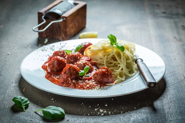 Spicy spaghetti bolognese with meatballs and parmesan — Stock Photo, Image