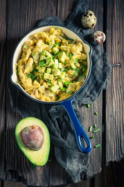 Homemade fried eggs with avocado for breakfast — Stock Photo, Image