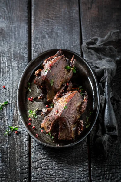 Two roasted pigeons with pepper and spices — Stock Photo, Image