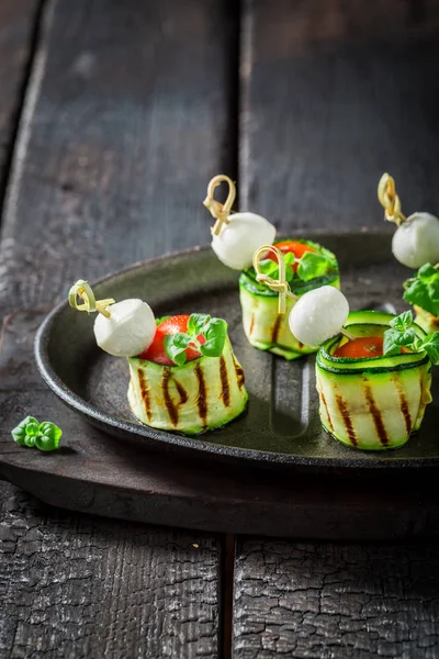 Delicious various cold snacks with fresh ingredients for party — Stock Photo, Image