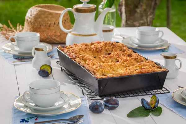 stock image Delicious cake with plum served with coffee in summer