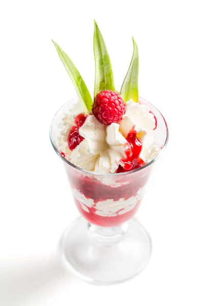 Sweet raspberry dessert with whipped cream on a white background — Stock Photo, Image