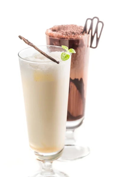 Closeup of chocolate and vanilla smoothies on white background — Stock Photo, Image