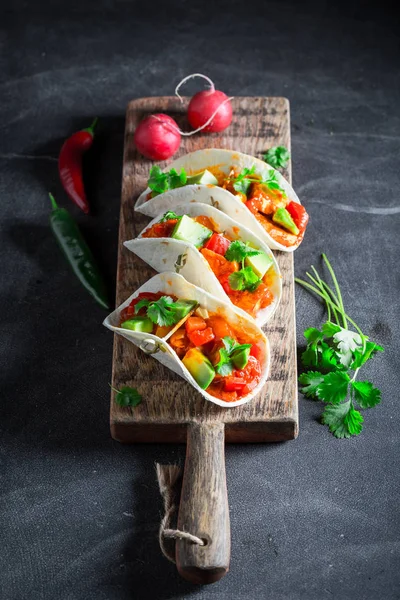 Delicious tacos with meat and spicy tomato sauce — Stock Photo, Image