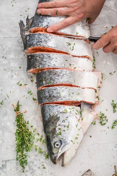 Preparing salmon in the summer garden for grill — Stock Photo, Image