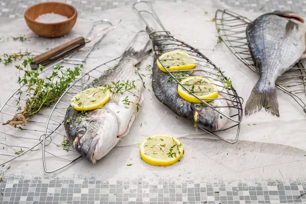 Freshly caught sea bream with herbs for grill — Stock Photo, Image