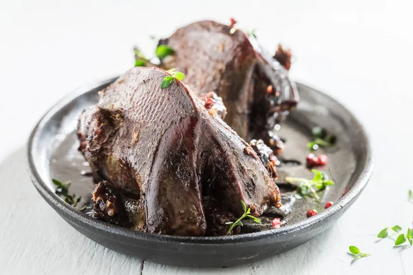 Roasted doves with spices and pepper on white background — Stock Photo, Image