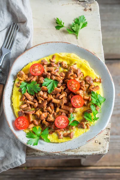 Tasty omelette with mushrooms, cherry tomatoes and parsley — Stock Photo, Image