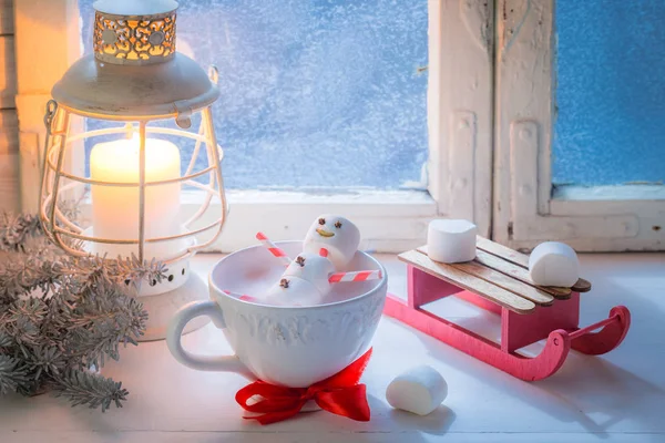 Relaxing in hot cocoa snowman made of marshmallows for Christmas — Stock Photo, Image