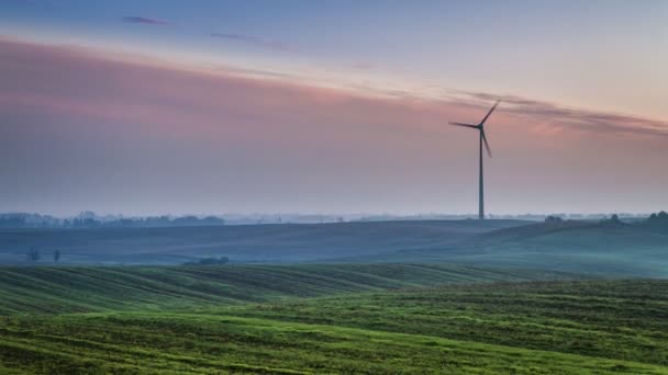 Beautiful sunrise over with a windmill in autumn, timelapse, 4K — Stock Video