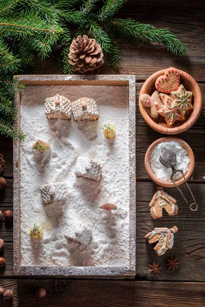 Gorgeous gingerbread cottages for Christmas with trees and snow — Stock Photo, Image