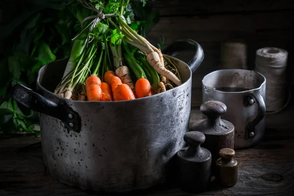 Ingredients for homemade broth with carrots, parsley and leek — ストック写真