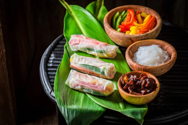 Preparing spring rolls with sweet and sour sauce — Stock Photo, Image