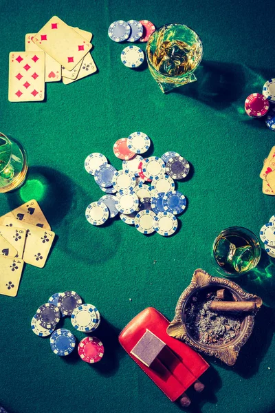 Chips and cards on vintage green table for poker — Stock Photo, Image