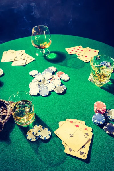 Closeup of gambling green table with chips and cards — Stock Photo, Image