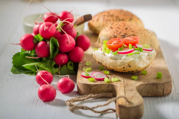 Tasty sandwich with crunchy bread, fromage cheese and radish — Stock Photo, Image