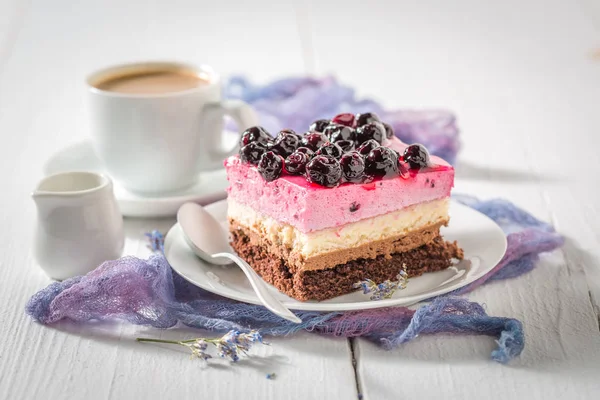 Homemade cake with black currant served with hot coffee — Stock Photo, Image