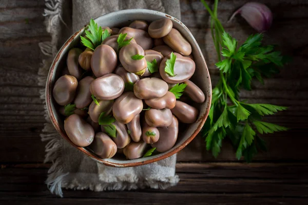 Healthy broad beans in old rustic kitchen — Stock Photo, Image