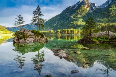Spring sunrise at Hintersee lake in Alps, Germany clipart
