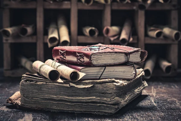 Magic scrolls and books in medieval library — Stock Photo, Image