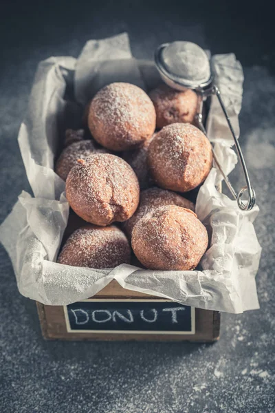 Sweet  mini doughnuts with powdered sugar — Stock Photo, Image
