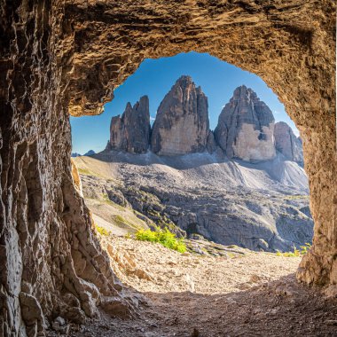 View to Tre Cime di Lavaredo from cave, Dolomites, Europe clipart