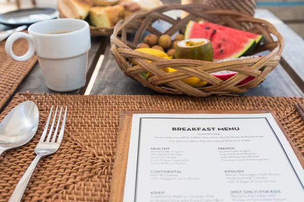Breakfast menu with fruit basket — Stock Photo, Image