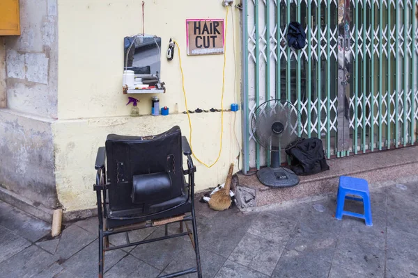 Open shop of a hairdresser in Hanoi, Vietnam