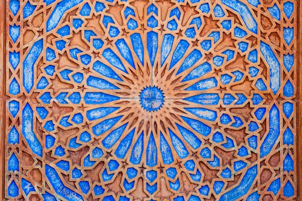 Heldere symmetrische cirkel patroon in oranje en blauw — Stockfoto