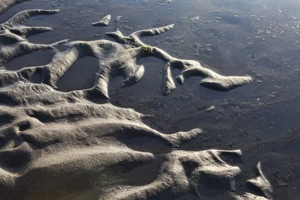 Padrões de areia na maré baixa — Fotografia de Stock