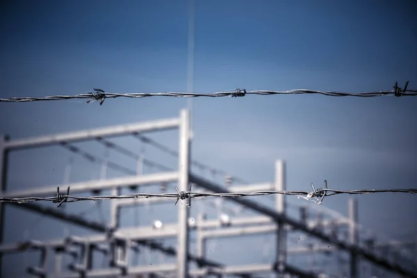 Barbed wire security fence — Stock Photo, Image