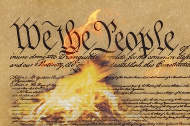 U.S. Constitution being destroyed by flames clipart