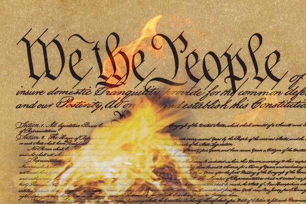 U.S. Constitution being destroyed by flames