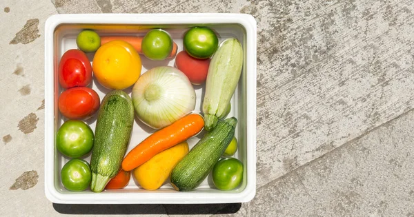 Fruit and vegetables washing in soapy water for coronavirus disinfection.