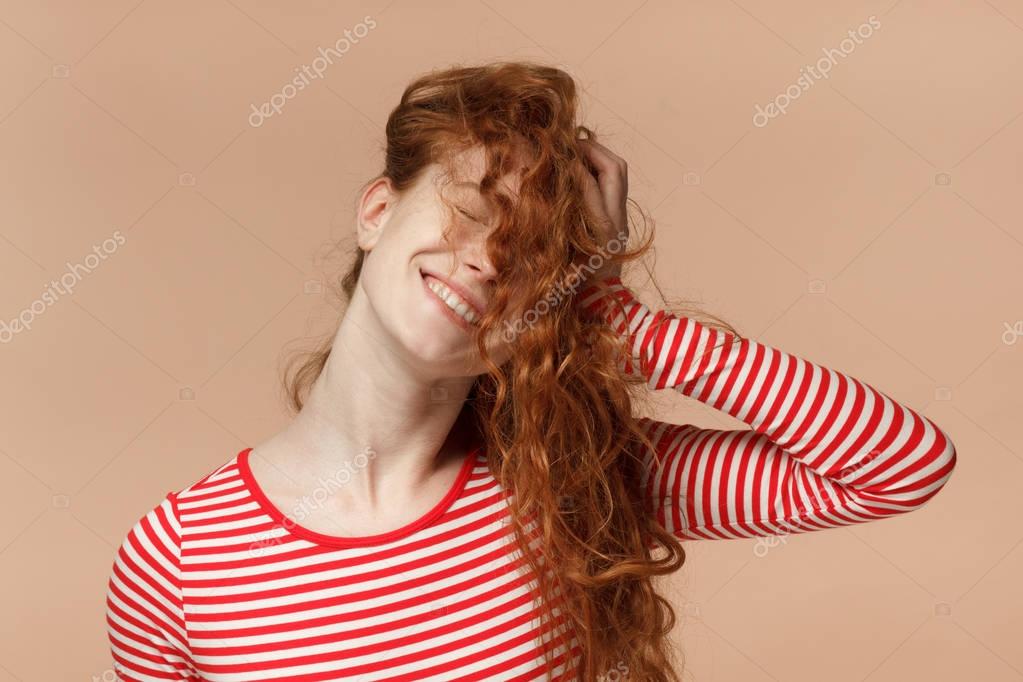Screaming blonde curly messy