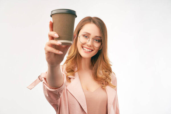 smiling business lady holding Cup of coffee or tea