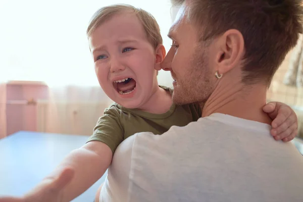 Small child bitterly bursts in tears, capricious — Stock Photo, Image