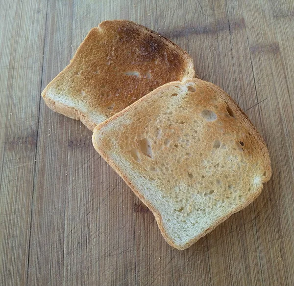 Tahtada Kızartılmış Ekmek — Stok fotoğraf