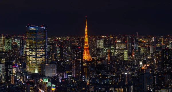 Una Foto Torre Tokio Paisaje Urbano Circundante Por Noche — Foto de Stock