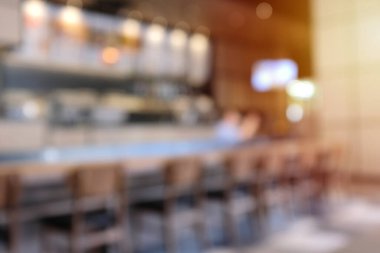 Hipster Kafe 'nin soyut bulanık arka planı ya da güneş ışığıyla donatılmış restoran iç mimarisi, montaj ve modelleme için