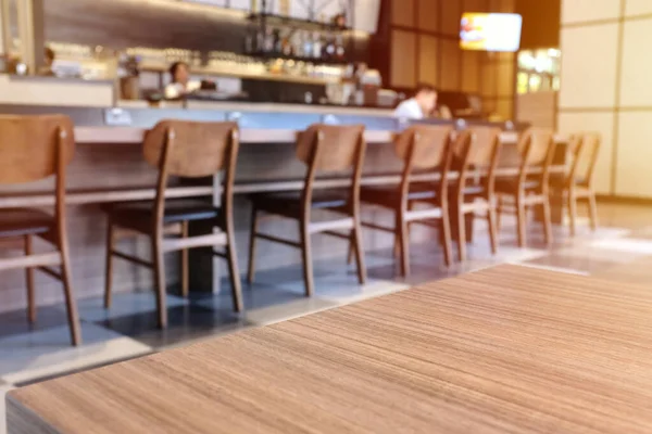 Wooden Board Empty Table Top Front Blurred Cafe Restaurant Background — Stock Photo, Image