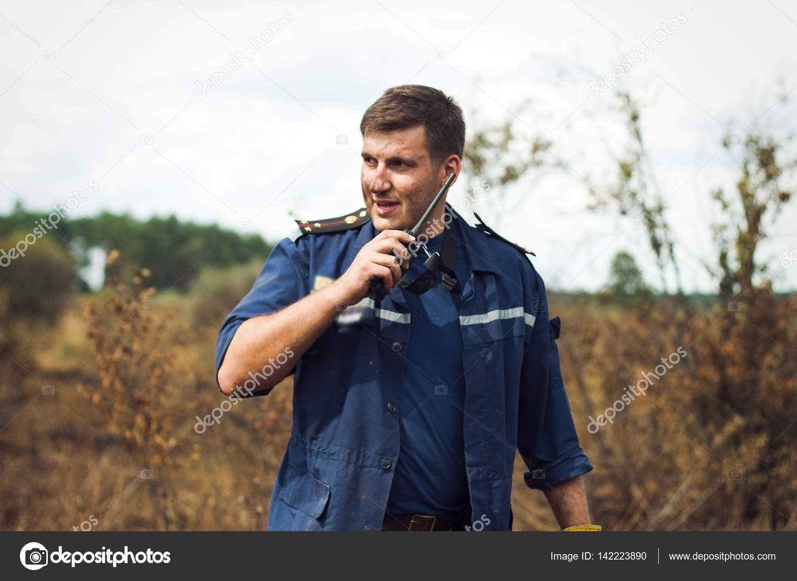Fireman using walkie talkie — Stock Photo © VAKSMANV101 #142223890