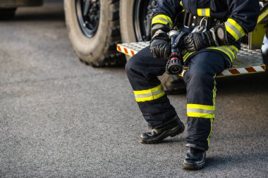  male firefighter  on duty clipart