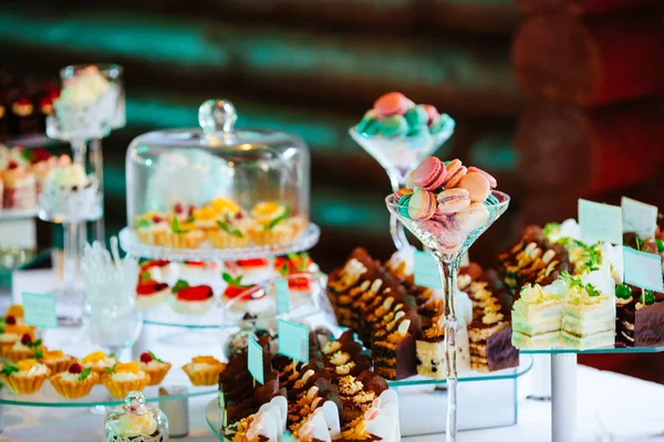 Sweets on holiday party table — Stock Photo, Image