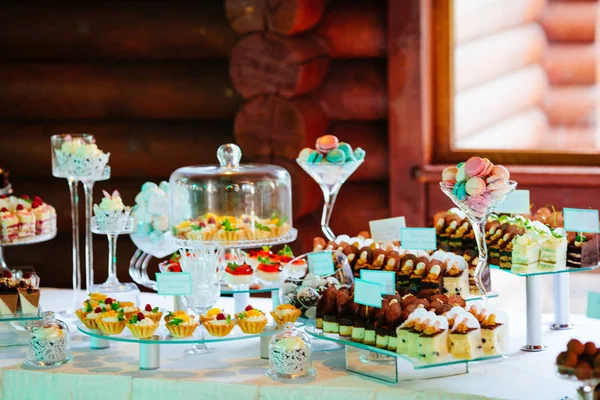 Sweets on holiday party table — Stock Photo, Image